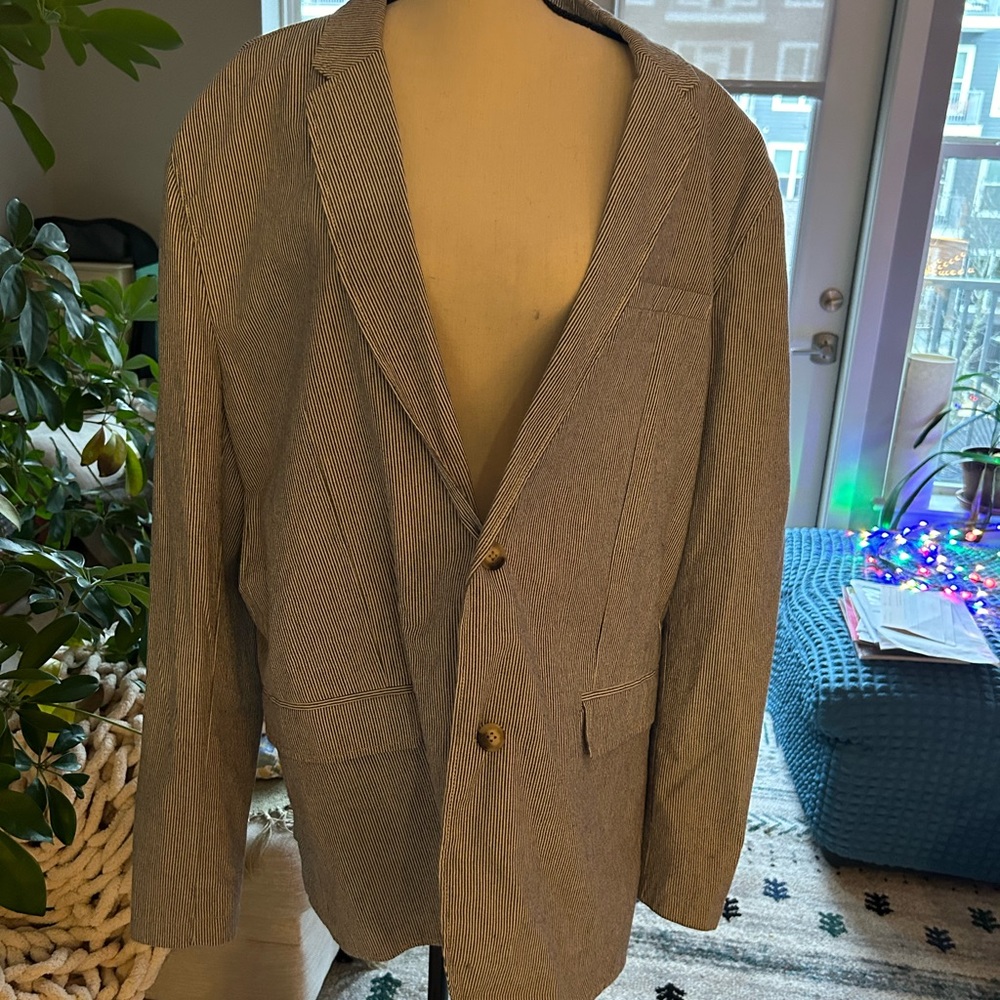 Blue and white pin stripped men’s jacket suit.